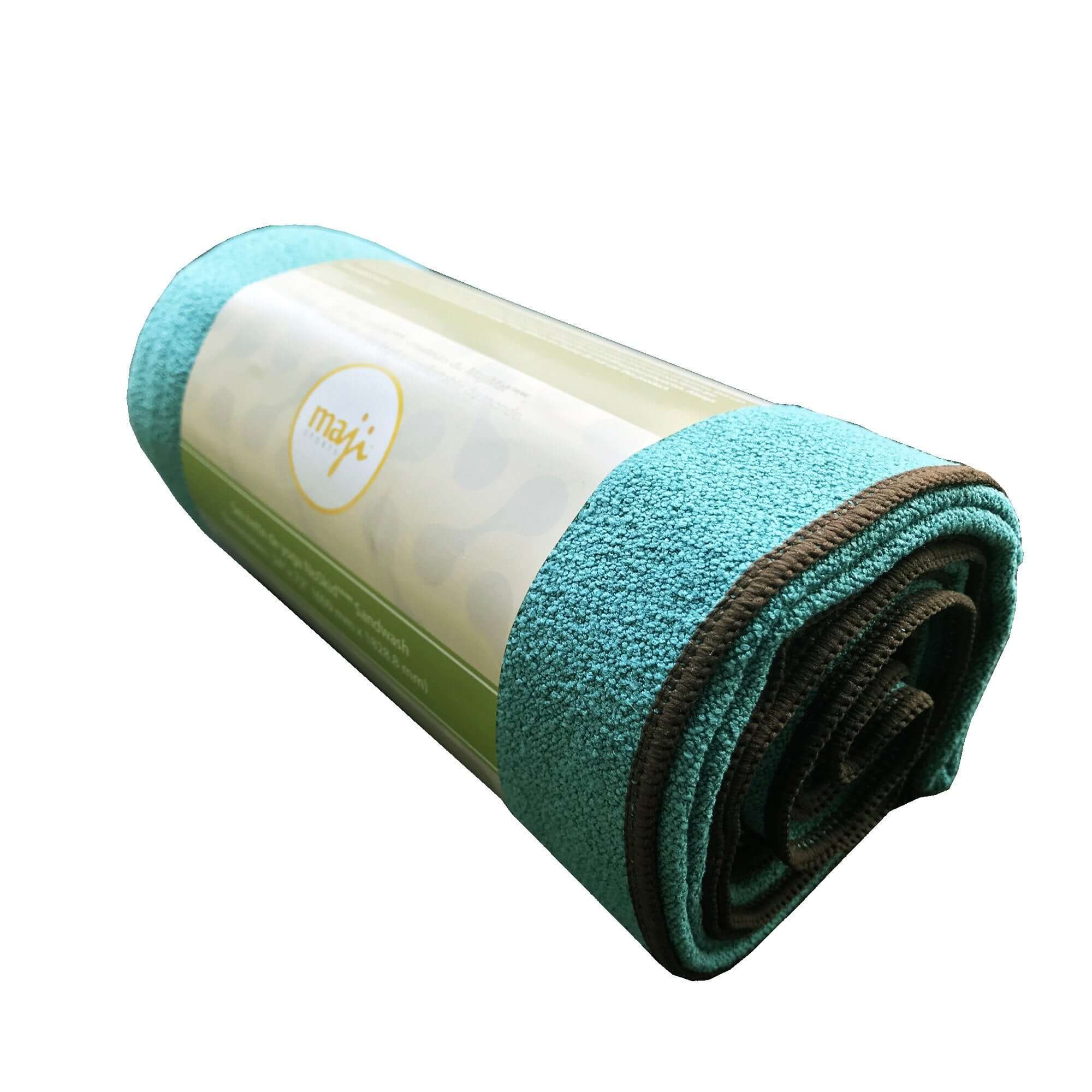 NoSkid Sand-Washed Yoga Mat Towel in various colors, showcasing its soft suede-like texture and slip-resistant surface.